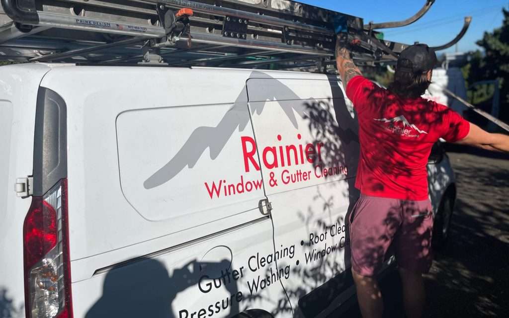 professional ladder and tools ontop of Rainier Window and Gutter Cleaning work van